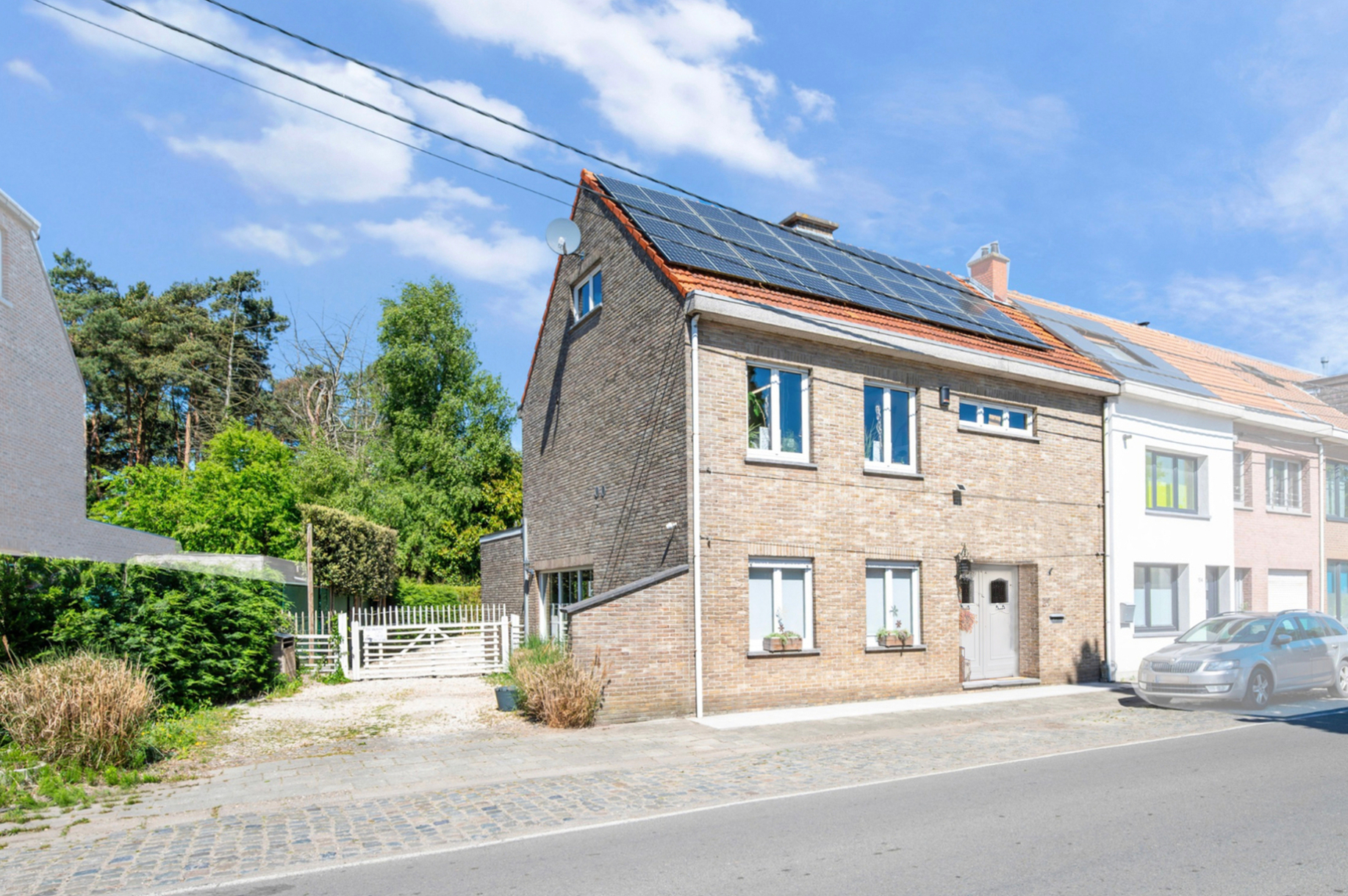 Afbeelding van Energiezuinige woning met magazijn en grote tuin!
